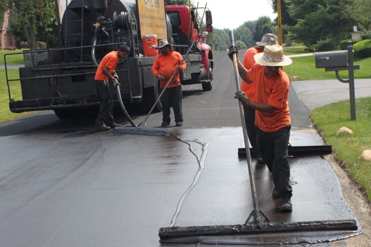 Revitalize Your Pavement with Sealcoating in Colorado Springs and Parking Lot Striping in Fort Collins by National Pavement Partners